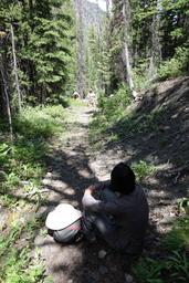 Slogging up the mining road with june (seated), bob g and aaron [fri jul 3 12:44:40 mdt 2015]