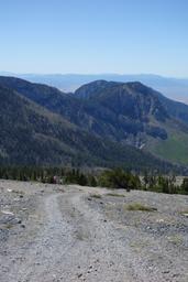 Struggling up the steep summit road, with acropolis peak in the distance [sat aug 31 12:17:18 mdt 2019]