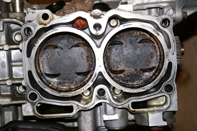 Pistons before cleaning