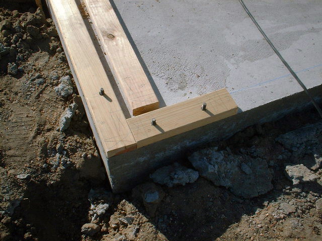 Corner detail of redwood bottom plate