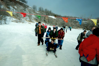 Scouts pushing a Klondike Derby sled